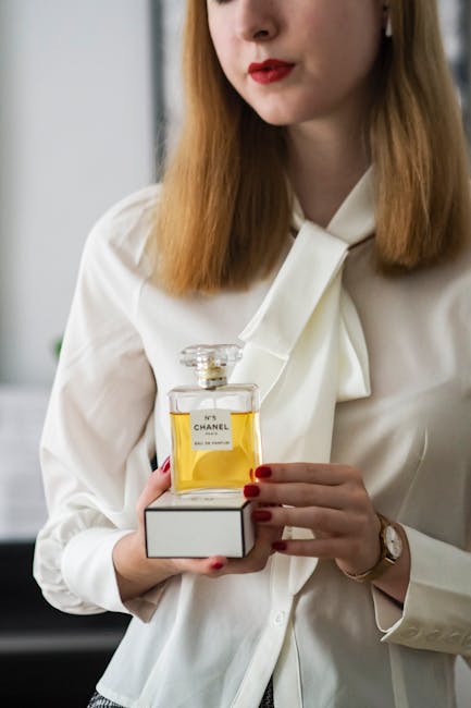 Luxury perfume bottle representing high-value personal asset insurance