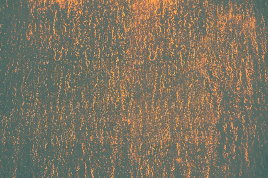 Textured rusted metal representing industrial risk assessment services